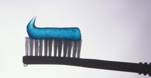 Toothbrush with Toothpaste --- Image by © Colin Anderson/Brand X/Corbis